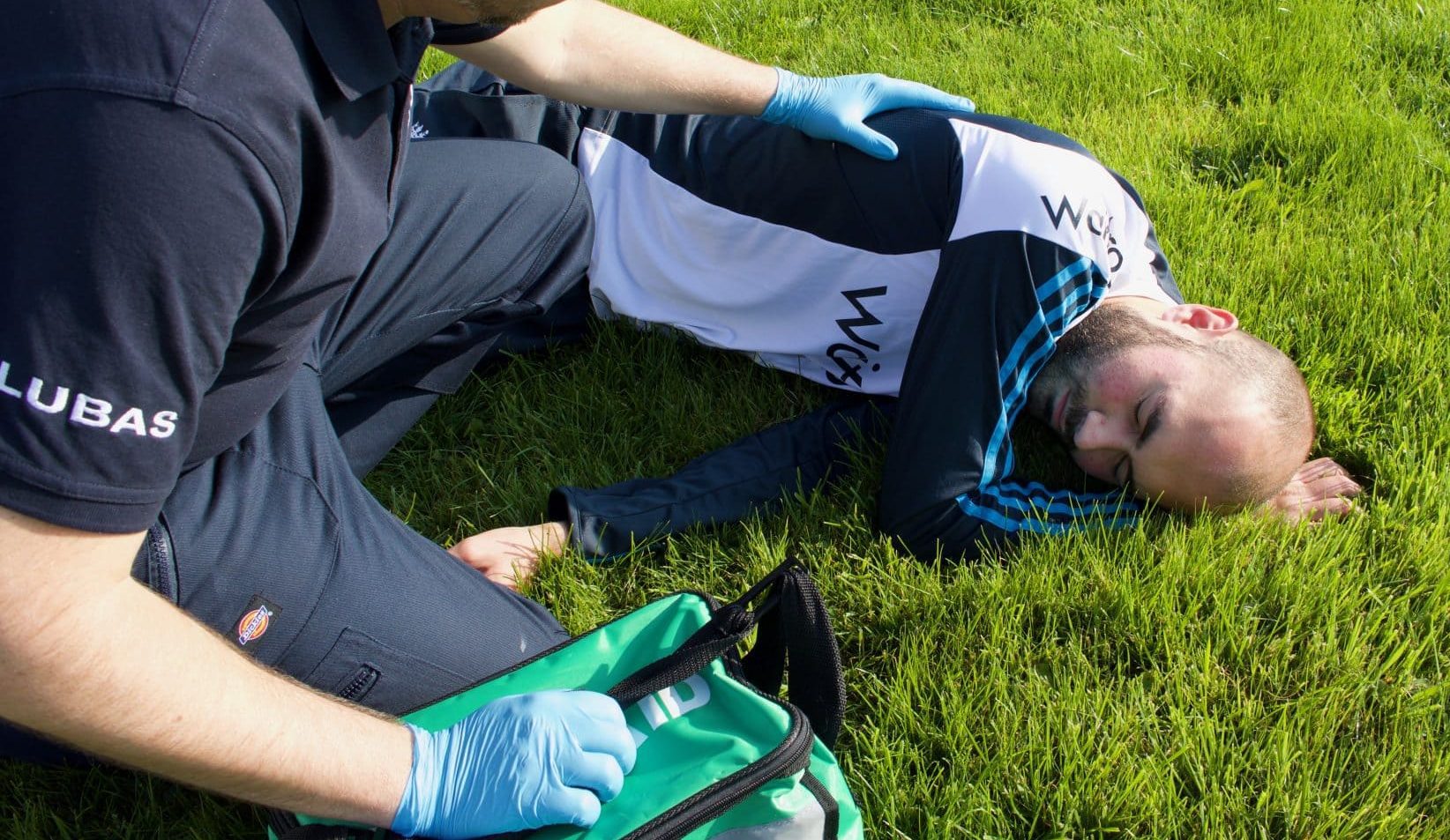 First Responder assessing an injured cricketer